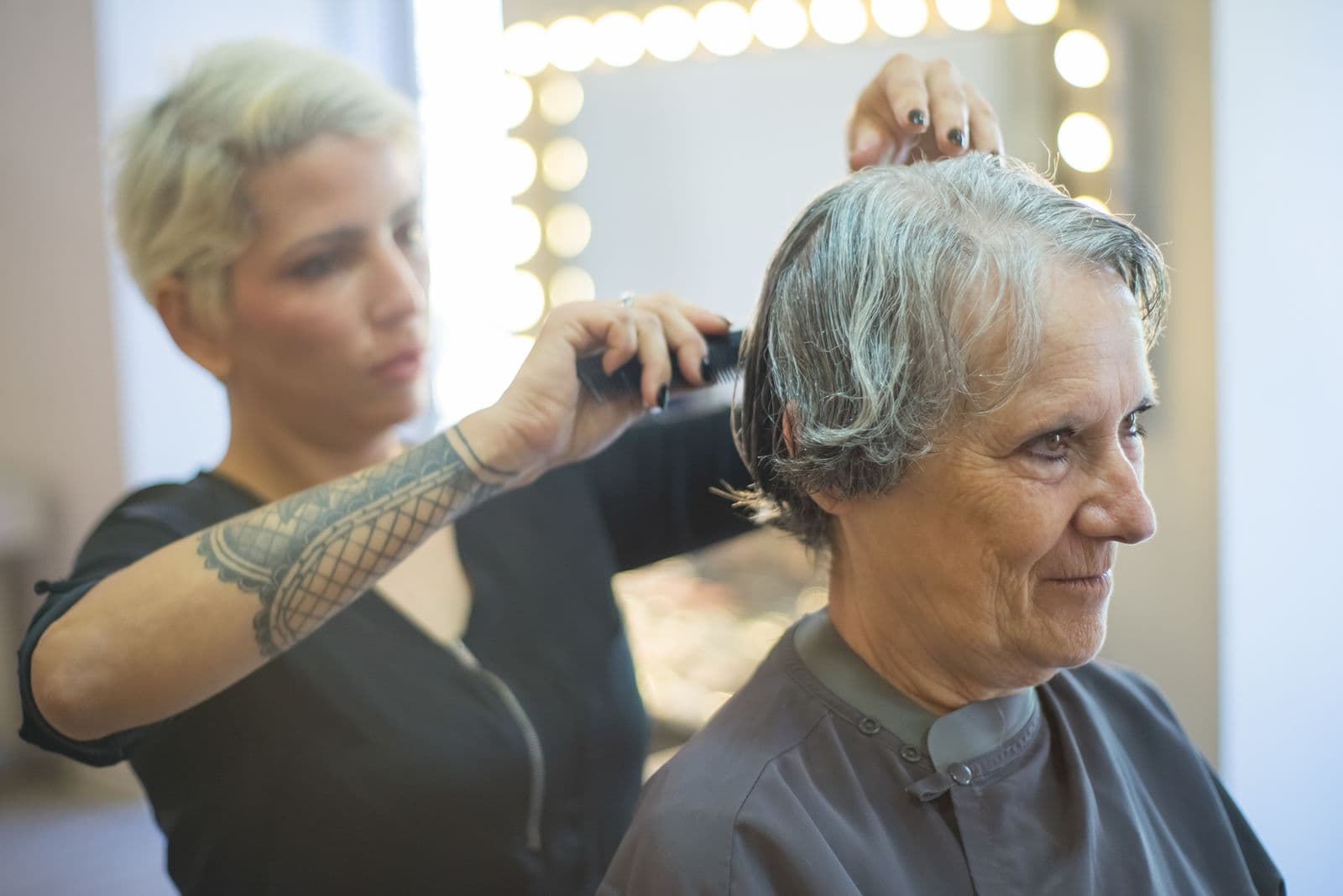 Woman with a beautifully finished fresh haircut and styled hair