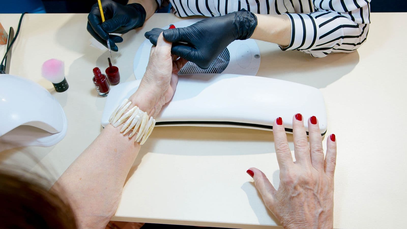 Manicure service in progress at the salon