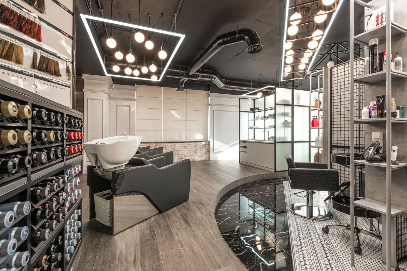 Elegant upscale hair salon interior featuring stylish chairs and warm lighting