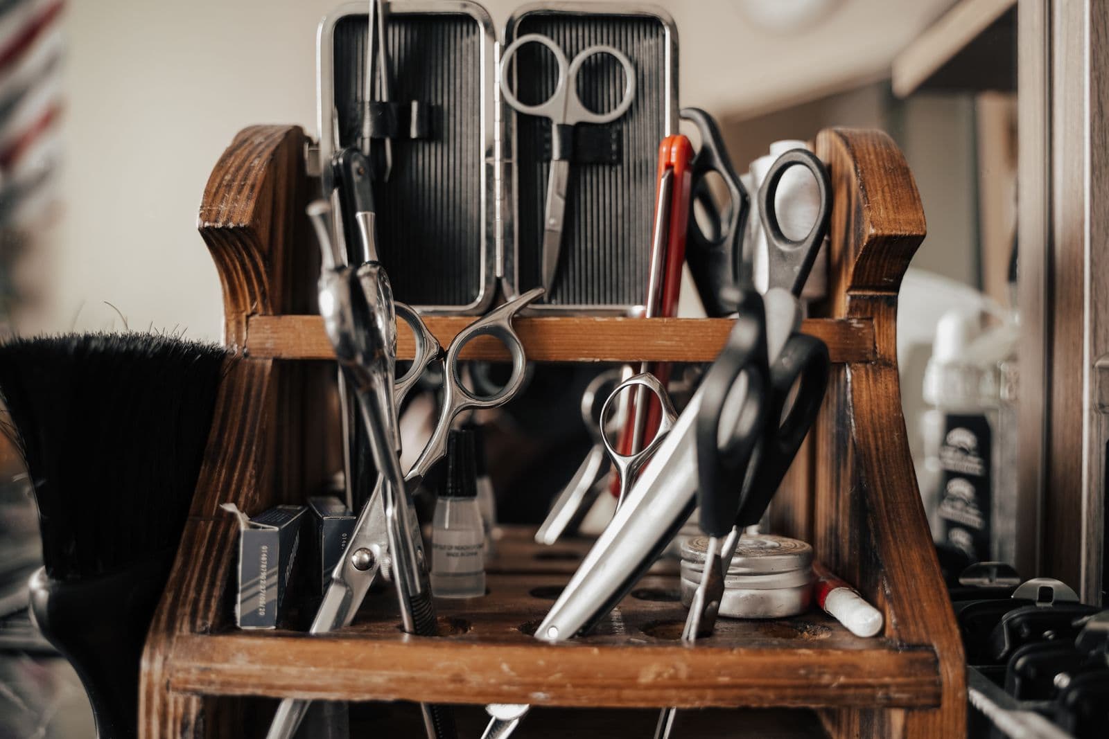 Arranged hair styling tools and accessories at a salon workstation